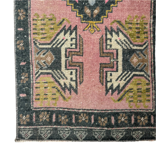 peony and olive pink vintage rug